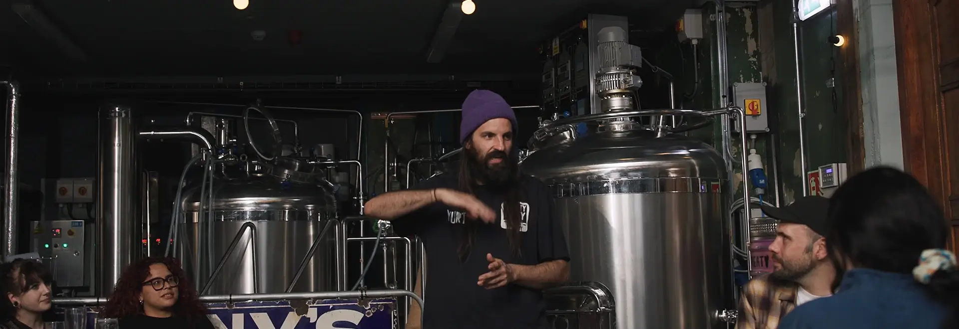 tcb staff talking about brewing